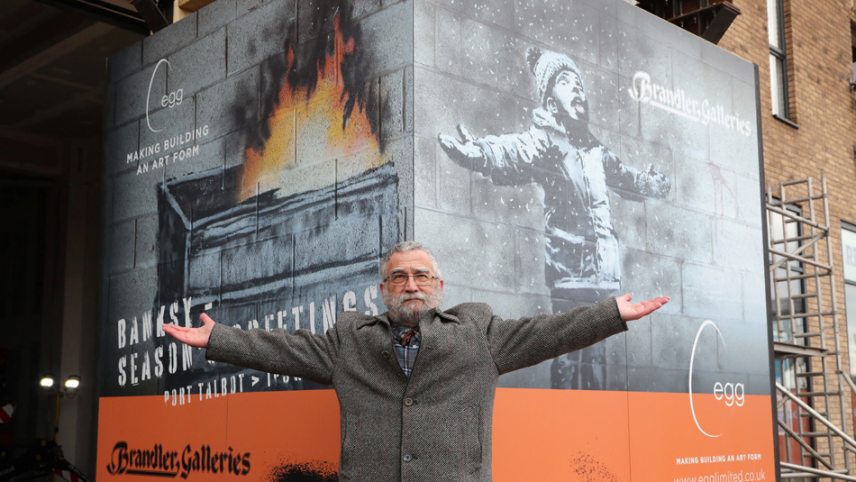 Art-dealer-John-Brandler-the-owner-of-Seasons-Greetings-by-street-artist-Banksy-2022-Port-Talbot-c-Geoff-Caddick-AFP-950.jpg