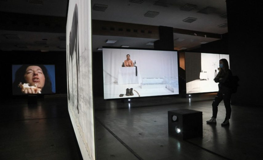 A visitor looks at a part of the exhibition "Memory of Being" by the performance artist Marina Abramovic  at the Meno Parkas gallery in Kaunas, Lithuania, on March 29, 2022. (Photo by PETRAS MALUKAS / AFP) / RESTRICTED TO EDITORIAL USE - MANDATORY MENTION OF THE ARTIST UPON PUBLICATION - TO ILLUSTRATE THE EVENT AS SPECIFIED IN THE CAPTION