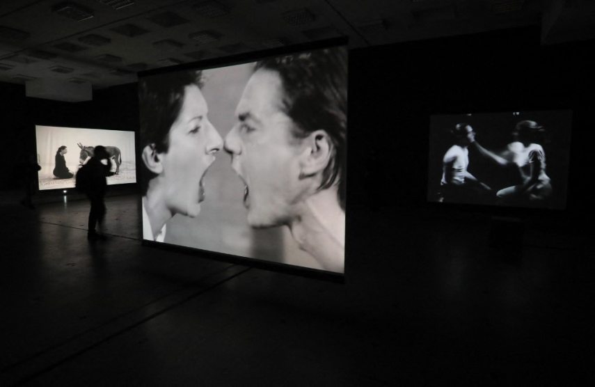 A visitor looks at a part of the exhibition "Memory of Being" by the performance artist Marina Abramovic  at the Meno Parkas gallery in Kaunas, Lithuania, on March 29, 2022. (Photo by PETRAS MALUKAS / AFP) / RESTRICTED TO EDITORIAL USE - MANDATORY MENTION OF THE ARTIST UPON PUBLICATION - TO ILLUSTRATE THE EVENT AS SPECIFIED IN THE CAPTION