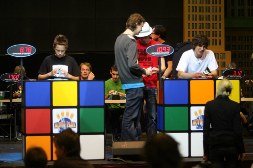 Young competitors try to solve the Rubik cube on the final day of the 2010 Rubik's Cube German Championships in the 3x3x3 cube 'Classical category' in the western German city of Bottrop on September 12, 2010. AFP PHOTO PATRIK STOLLARZ (Photo by PATRIK STOLLARZ / AFP)