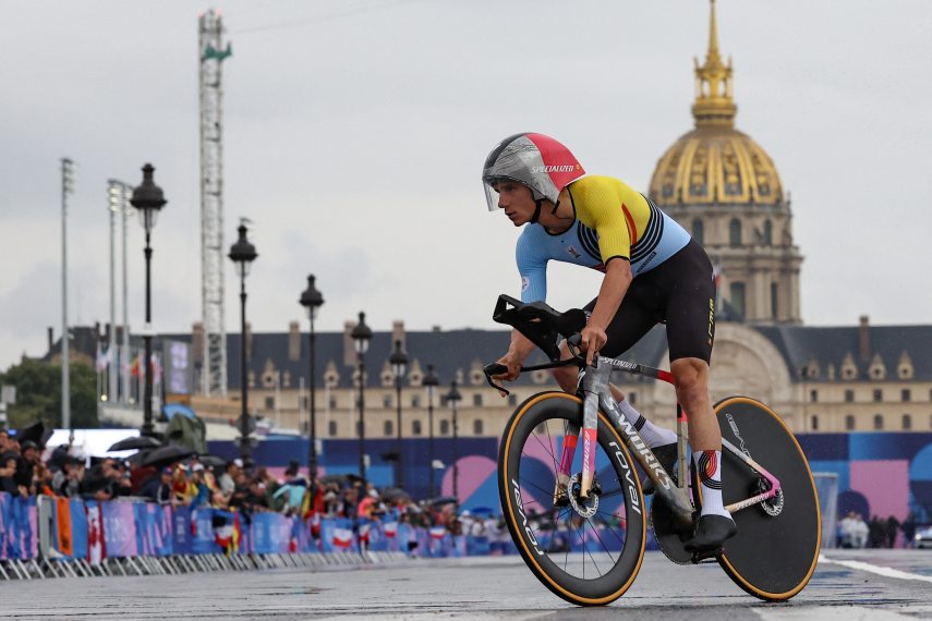 Belgium's Remco Evenepoel cycles past Invalides as he competes in the men's road cycling individual time trial during the Paris 2024 Olympic Games in Paris, on July 27, 2024. (Photo by Emmanuel DUNAND / AFP)