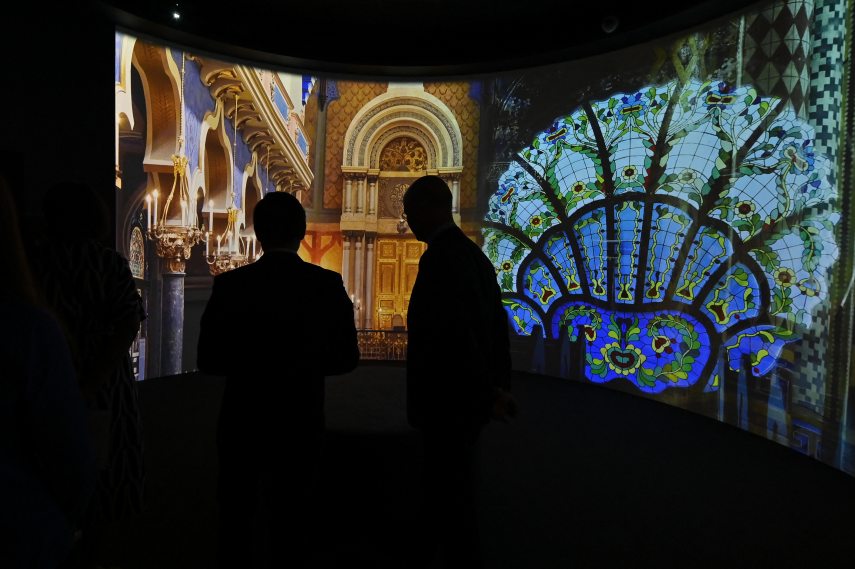 ABU DHABI, UAE - SEPTEMBER 11: People inspect the items during the ''Letters of Light'' exhibition held in Louvre Abu Dhabi in Abu Dhabi, United Arab Emirates on September 11, 2023. Waleed Zein / Anadolu Agency
Waleed Zein / ANADOLU AGENCY / Anadolu via AFP