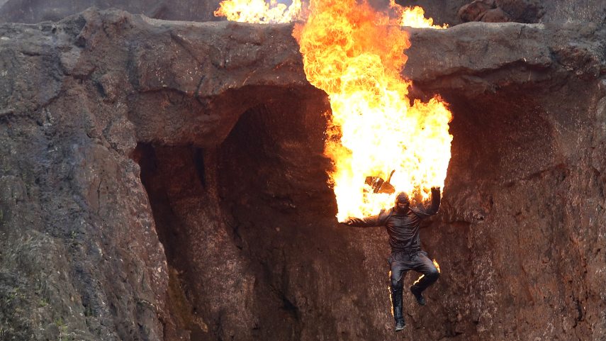 PRODUCTION - 30 June 2021, North Rhine-Westphalia, Lennestadt: A stuntman falls into the depths in flames during a rehearsal for the play "The Oil Prince" on the open-air stage of the Elspe Festival. For the first time since 2019, the Karl May Games will take place again in Elspe from Friday evening (8.15 pm). Until September 5, Winnetou and Old Shatterhand fight against the oil prince on the natural stage in the Sauerland. (to dpa "Karl May Games Elspe take place as a model project") Photo: Rene Traut/dpa
Rene Traut / DPA / dpa Picture-Alliance via AFP